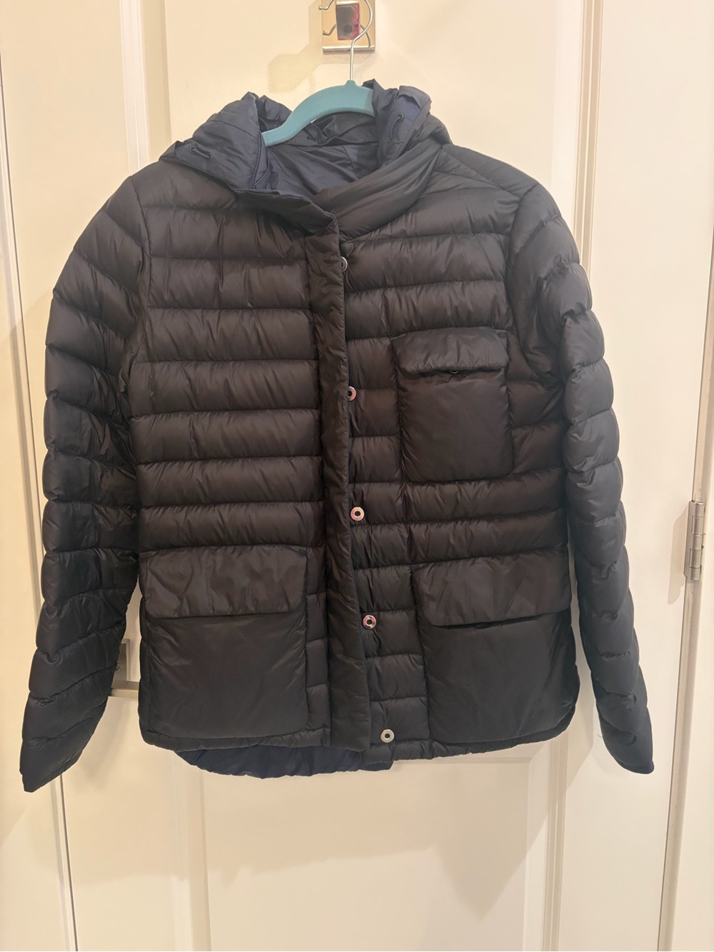 Athleta Pulse Reversible Down Jacket in the Black/Navy